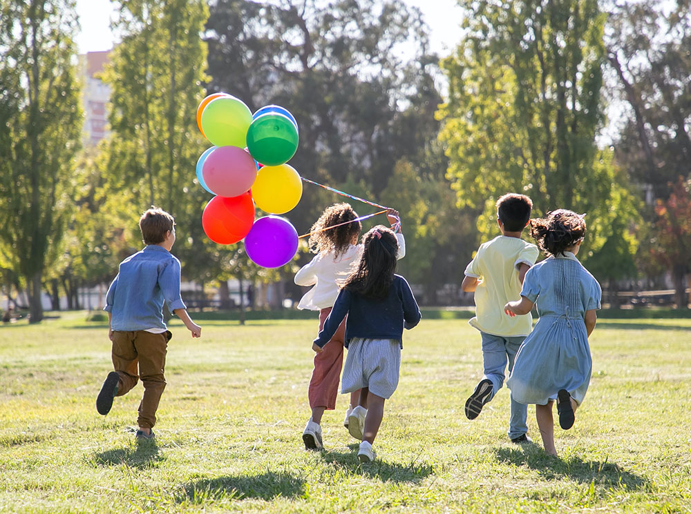 Children playing with balloons